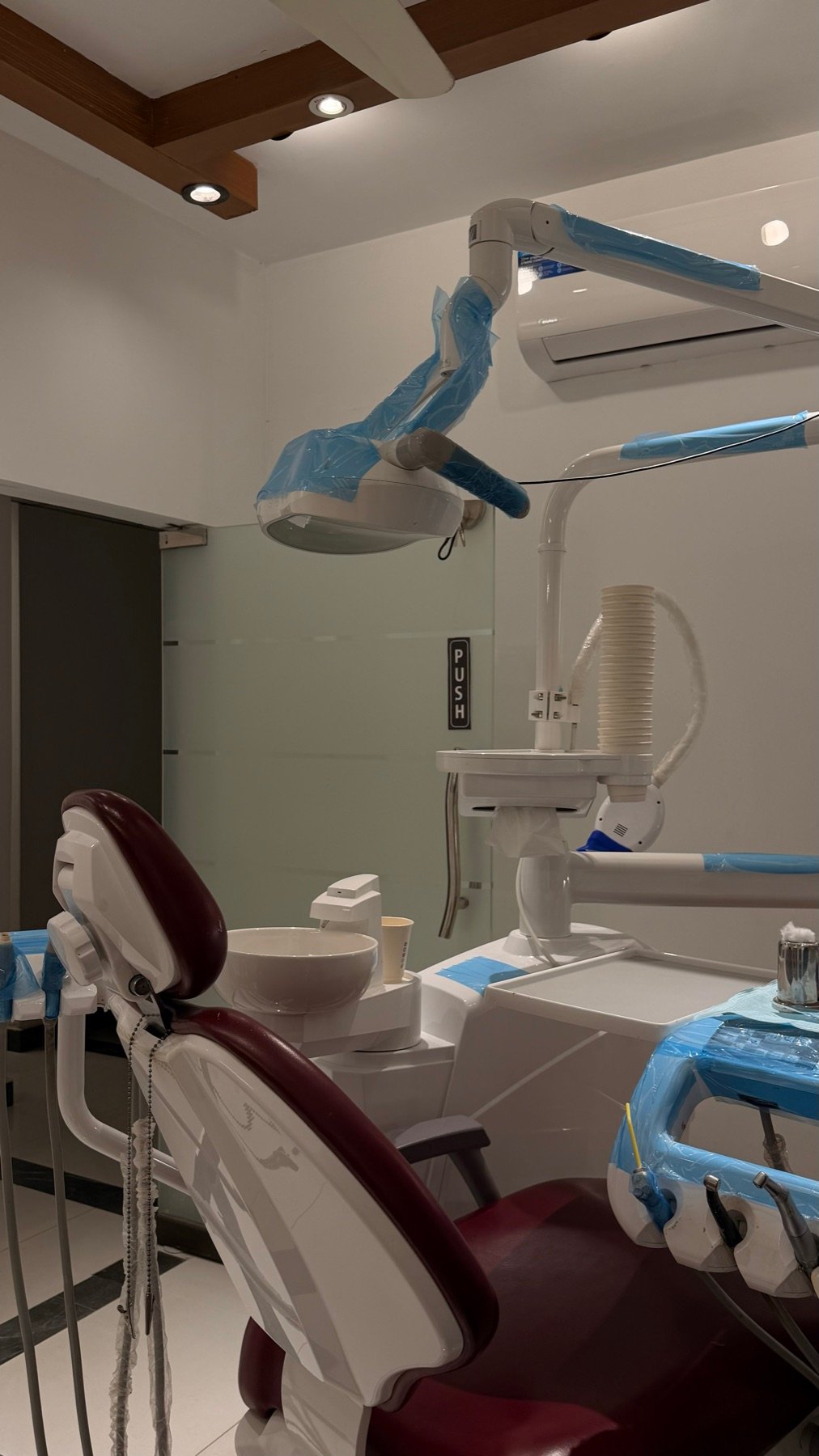 Dental chair in a treatment suite at Ali Ahmad Dental Associates
